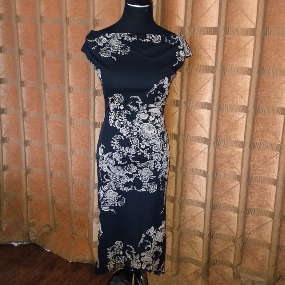 Cap sleeve beautiful asymmetrical dress.